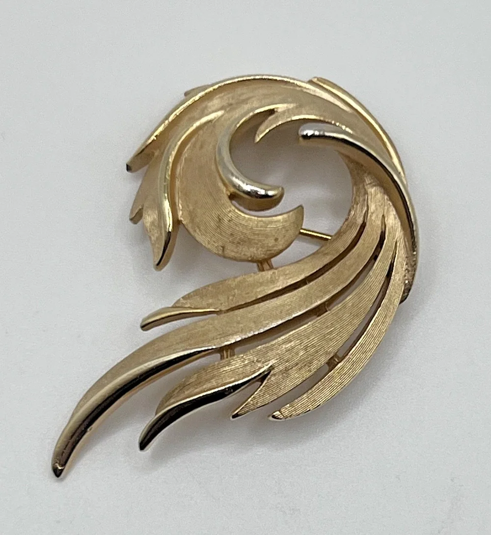 Vintage Crown Trifari Classic Textured Gold Tone Open Swirl Costume Brooch
